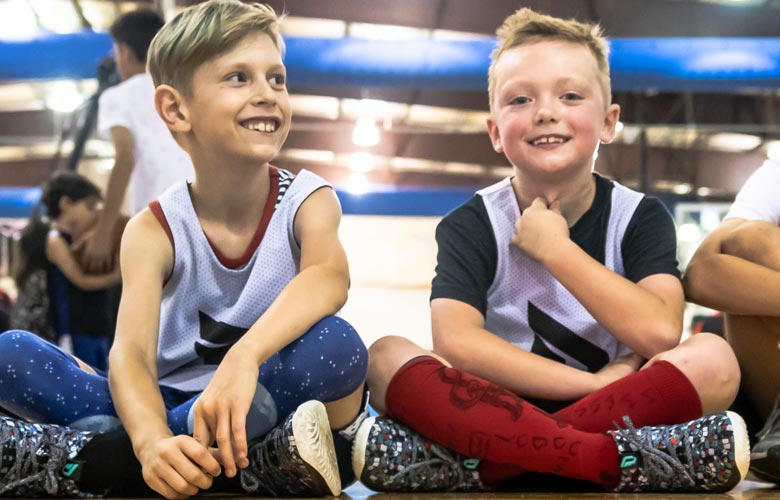 Two Boys at Basketball Camp Two happy boys at basketball camp