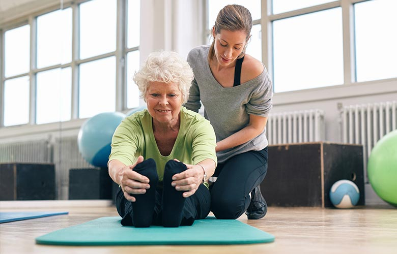 Woman Retching Active Aging | YMCA of Columbia-Willamette